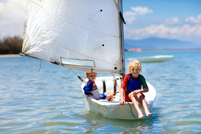 Kids on a sail boat